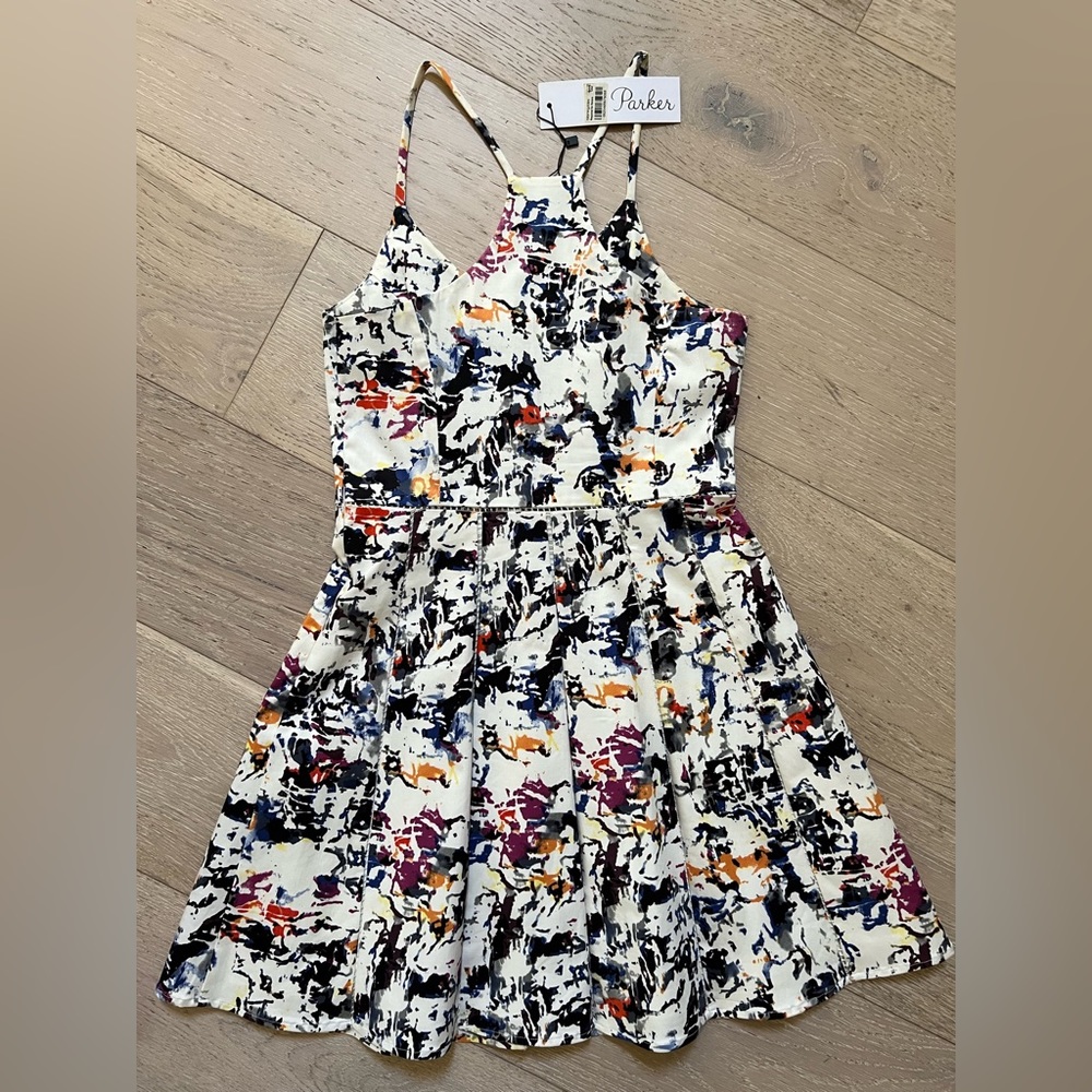 Parker dress. Size Small. White base with multi color print. With tag.